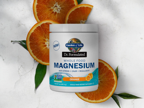 Garden of Life Dr. Formulated Whole Food Magnesium Orange 197.4g front tub packaging showing product name and branding