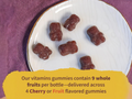 Garden of Life Kids Multi Gummies Organic Fruit Flavor 120 Count close up of gummies next to bottle