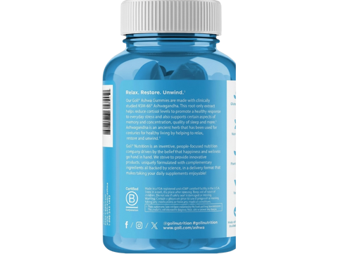 Blue supplement bottle with white cap on a white background
