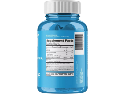 Blue supplement bottle with white cap on a white background