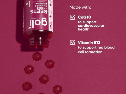Bottle of GOLI Beet Oil with ingredients listed on a pink background