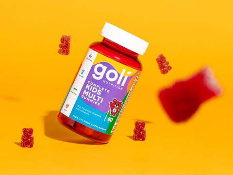 Goli Kids Multi Gummies bottle with gummy bears on a yellow background