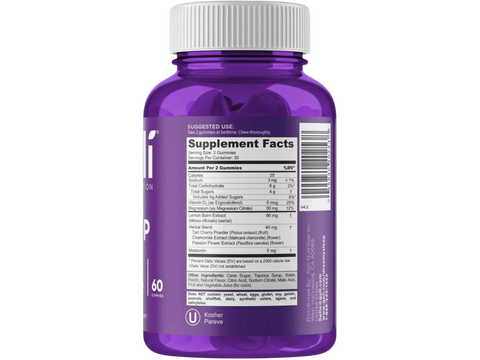 Purple supplement bottle with white cap on a white background