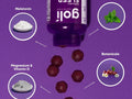Purple supplement bottle with ingredients labeled on a purple background