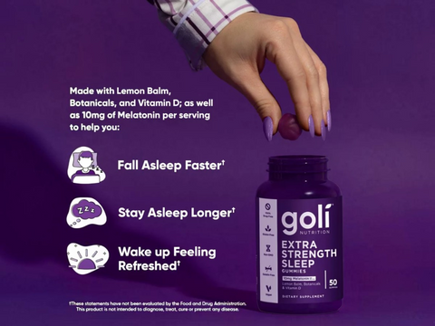 Goli Extra Strength Sleep Gummies bottle with hand holding a gummy on a purple background