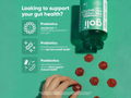 Gut health supplement bottle with text and icons on a green background