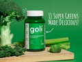 Goli SuperGreens gummies bottle with broccoli and celery on a green background