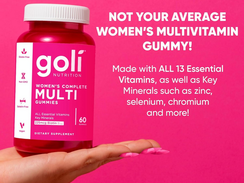 Goli Nutrition women's multivitamin gummy bottle on a pink background with text about vitamins and minerals.