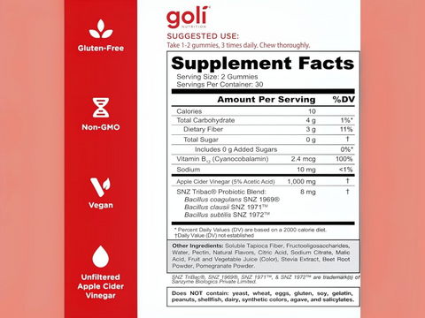 Goli supplement label with red and white design on a peach background