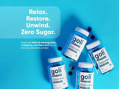 Goli supplement bottles on a blue background with text about relaxation and zero sugar content.