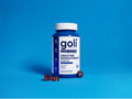 Goli Creatine Monohydrate Gummies bottle on a blue background