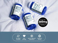 Three bottles of Goli Magnesium Omnin on a white fabric background with product details.
