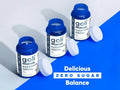 Three bottles of goli magnesium supplement on a blue and gray background with text 'Delicious Zero Sugar Balance'.
