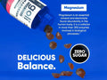 Goli supplement bottle with magnesium capsules on a blue background