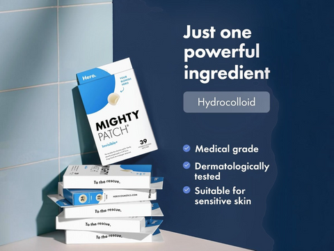Stack of Mighty Patch hydrocolloid packages with promotional text on a blue background