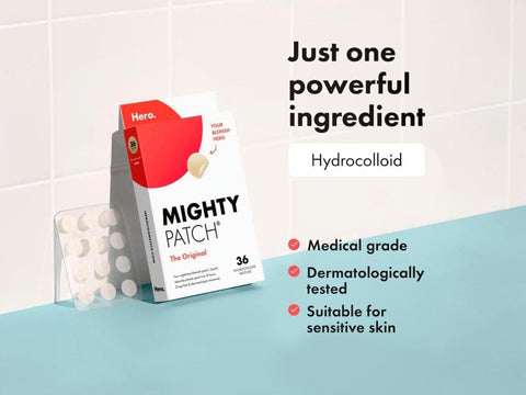 Mighty Patch packaging with hydrocolloid information on a light blue surface.