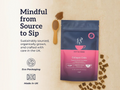 Collagen powder package with spoon and scattered collagen pieces on a beige background