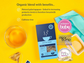 Tea package for 'Hotter Mama' with a glass of tea, teabags, and baby products on a yellow background.
