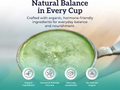Green smoothie in a spoon with text about natural balance and organic ingredients.