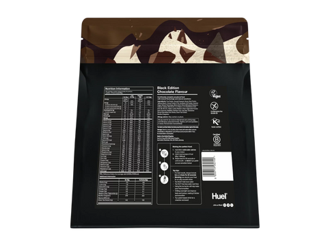 Black Huel protein powder package with nutritional information on a white background