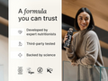Woman holding a bottle with text about trust, expertise, testing, and science.