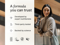 Woman holding a bottle with text about a trusted formula, developed by experts and third-party tested.