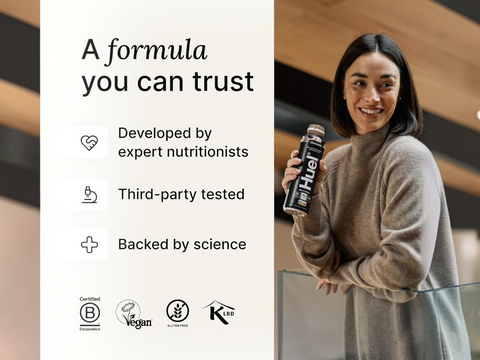 Woman holding a bottle with text about a trusted formula, developed by experts and third-party tested.