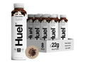 Huel chocolate protein bottles with packaging on a white background