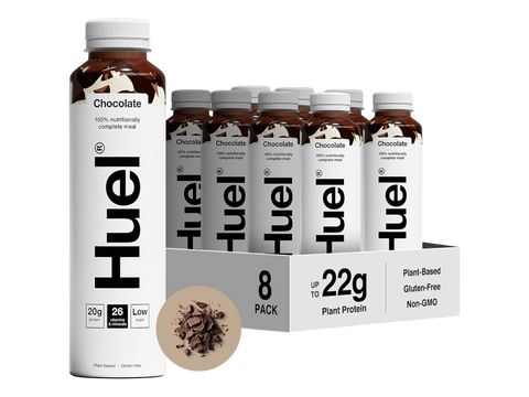 Huel chocolate protein bottles with packaging on a white background