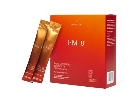 A box of I-M-8 Daily Ultimate Longevity + Healthy Aging powder alongside two individual sachets, shown on a plain white background.