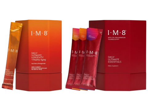 Two red and orange I-M-8 Smart Ultimate Longevity vitality storage boxes shown with their individual foil packets on a plain white background.
