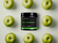 Kaged pre-workout supplement container surrounded by green apples on a light background