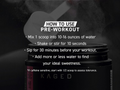 Kaged pre-workout supplement container with usage instructions on a dark background