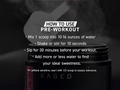 Kaged pre-workout supplement container with usage instructions on a dark background
