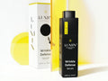 Lumin Daily Defense Face Serum for Men, 15mL bottle & box, on white background.