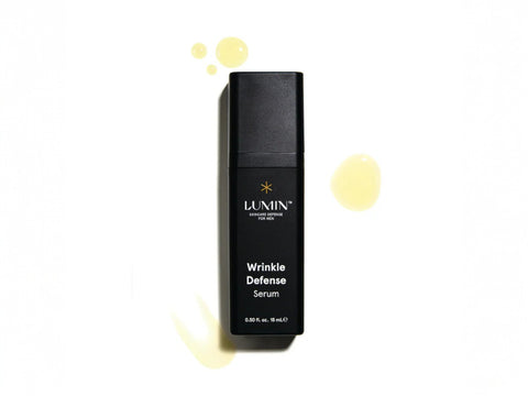 Lumin Daily Defense Face Serum for Men, 15mL bottle, on white background.