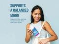 Natural Vitality CALM Magnesium Gummies 330mg Raspberry Lemon Bottle Lifestyle Image Supports Balanced Mood 60 Gummies