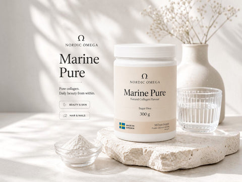 Nordic Omega Marine Pure collagen powder in a white jar, styled on a stone slab with a small glass bowl of powder, a ribbed glass, and a ceramic vase in a bright, sunlit setting.