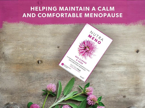 Nutra Meno product packaging with pink flowers on a wooden surface