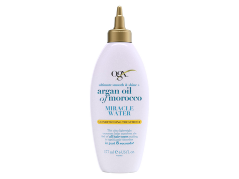 OGX Argan Oil of Morocco Miracle Water bottle on a white background