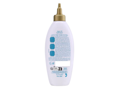 White bottle with gold pump on a white background