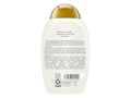 Shampoo bottle with gold cap on a white background