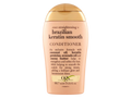 Conditioner bottle with gold cap and beige body on a white background