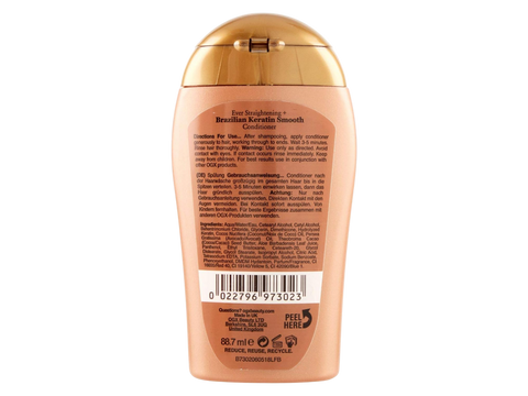 Back of a shampoo bottle with gold cap on a white background
