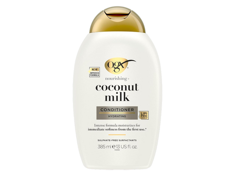 OGX Coconut Milk conditioner bottle on a white background