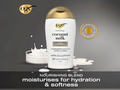Coconut milk conditioner bottle with splashes on a dark background