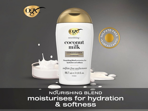 Coconut milk conditioner bottle with splashes on a dark background