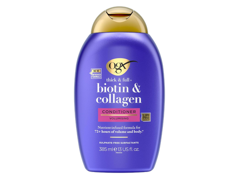 Purple conditioner bottle with gold cap on a white background