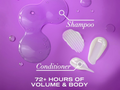 Shampoo and conditioner with droplets on a purple background