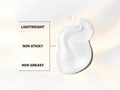 White cream sample with text labels on a light background